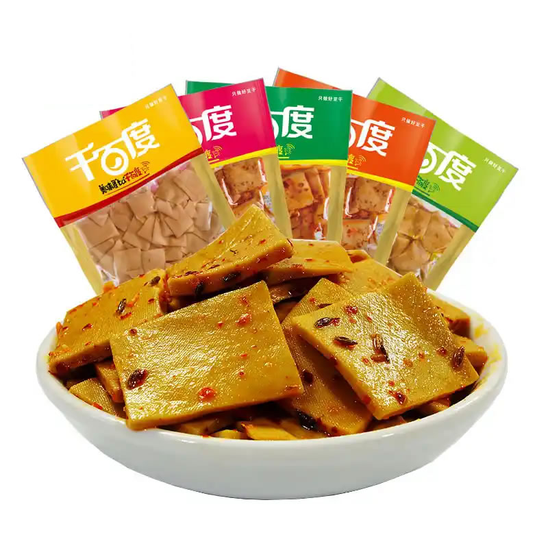 What industries are bag-feeding packaging machines suitable for?